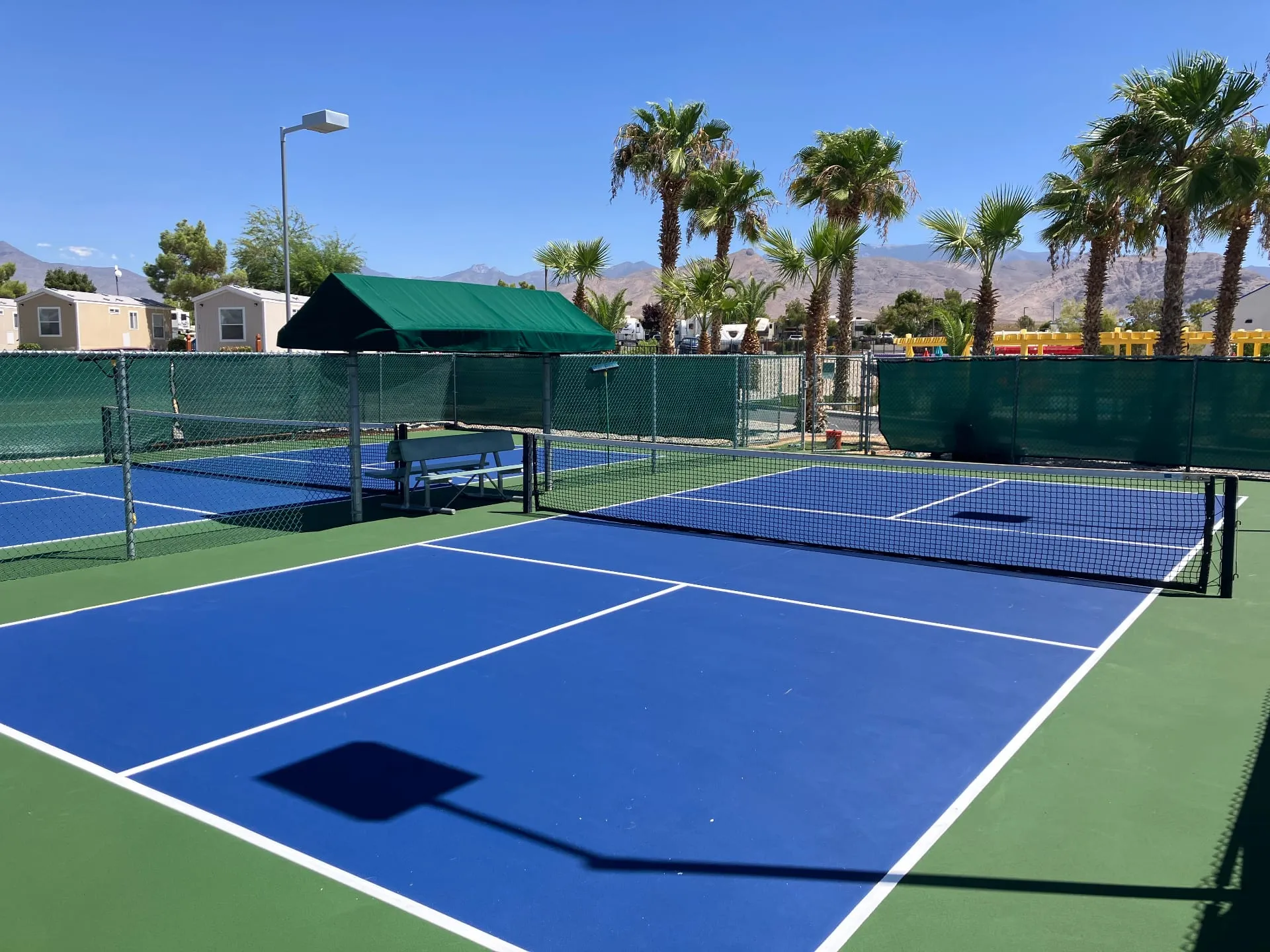 Resurfaced blue and green pickleball courts at Wine Ridge in Pahrump, Nevada