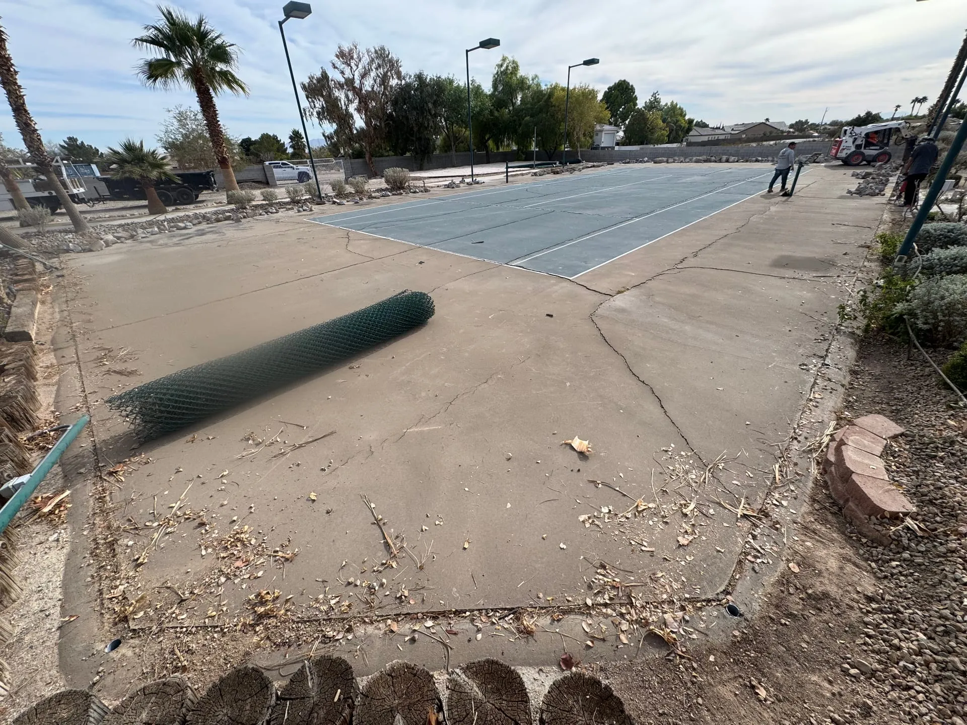Court slab in Las Vegas with structural cracks running through the concrete before a full rebuild