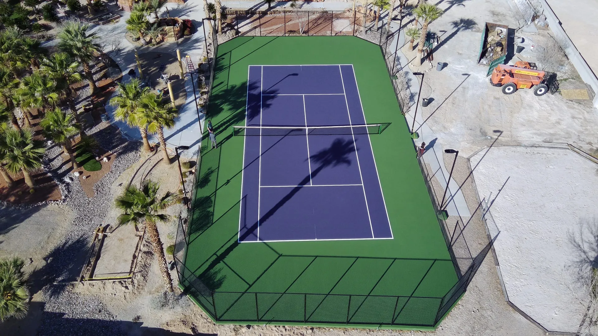 Newly resurfaced blue and green pickleball court in Las Vegas, NV with fresh white striping